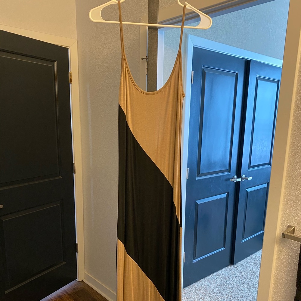 Maxi dress in Brown with Black stripes.